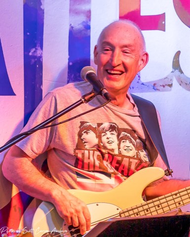 Phil Hennen singing and playing bass